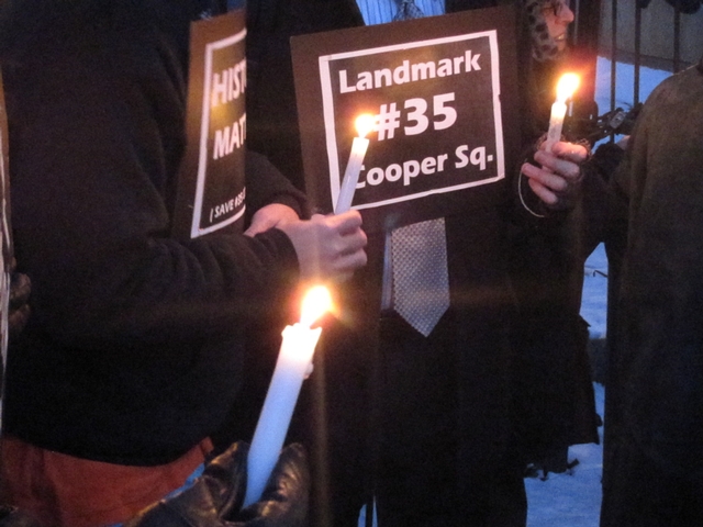 Demonstrators held a candlelight vigil in front of 35 Cooper Square to protest the 1825 building's planned demolition.