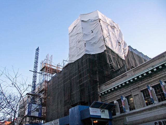 The men fell 65 feet inside an elevator shaft said LiMandri.
