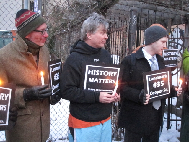 Demonstrators at the candlelight vigil in front of 35 Cooper Square.
