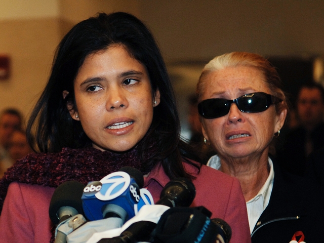 Alejandra St. Guillen (L) addresses the media with her mother Maureen (R) after Darryl Littlejohn was arraigned for the murder of Imette St. Guillen, at Brooklyn Supreme Court, March 23, 2006.