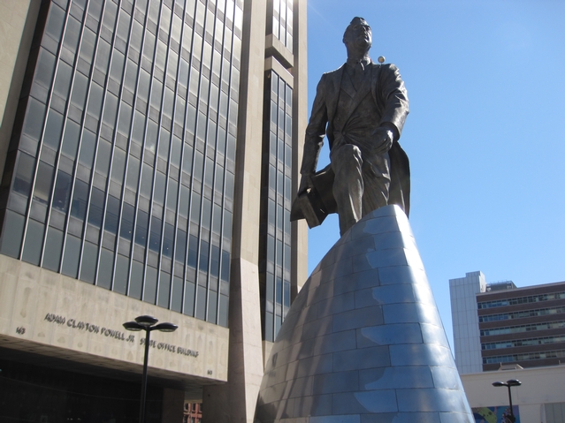 A statue of Adam Clayton Powell Jr. in the plaza of the state office building named after him.