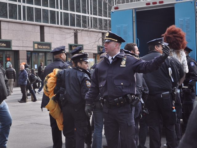 Police arrested the protesters after about seven minutes.