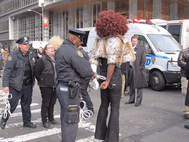 Kitten Withuwip (aka Caldwell), 24, is cuffed by police.