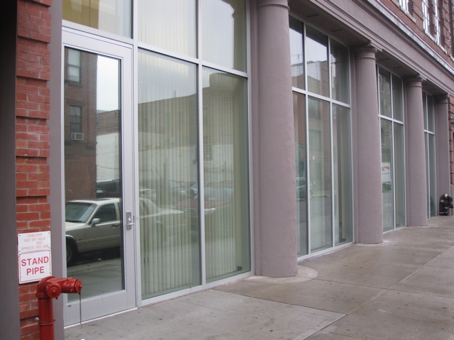 The front of a recently renovated building on 127th Street.