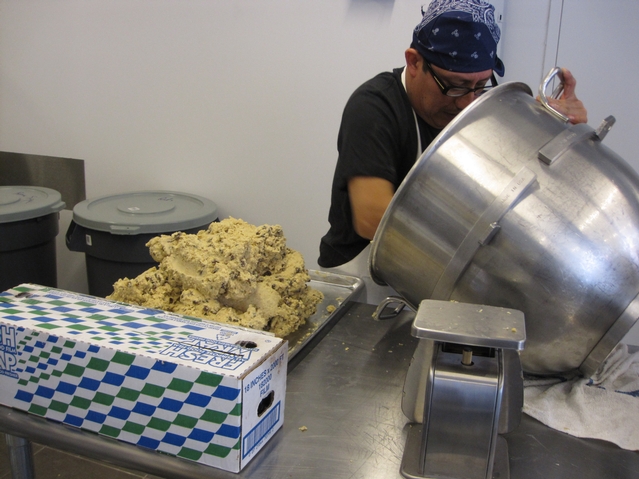 A worker unloads cookie dough at Levain Bakery.