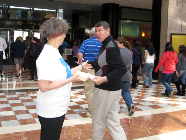 A Poets House intern handed out poetry in the World Financial Center Thursday.