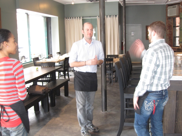 Bad Horse Pizza owner John Kandel helped prepare staff for Friday's grand opening.