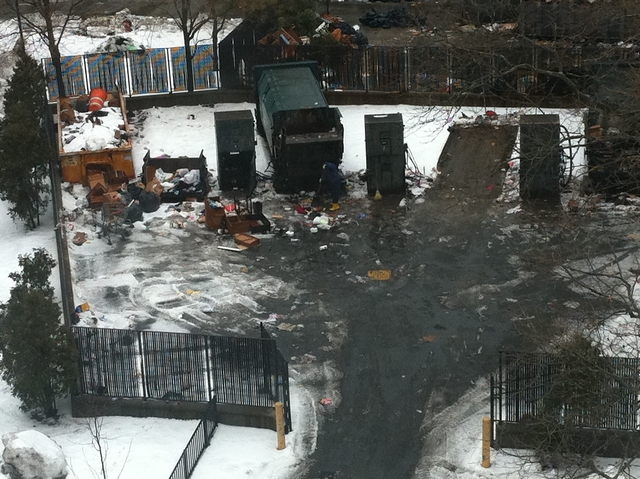 A photo of the NYCHA trash area prior to the clean-up.