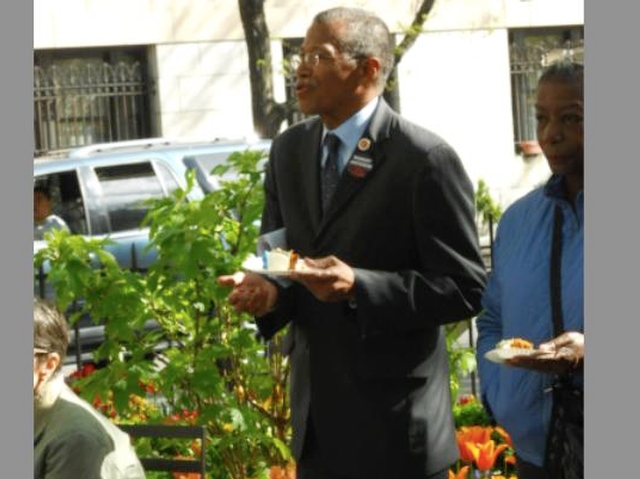 City Councilman Robert Jackson enjoys cake at the 2010 celebration of John James Audubon's 226th birthday.