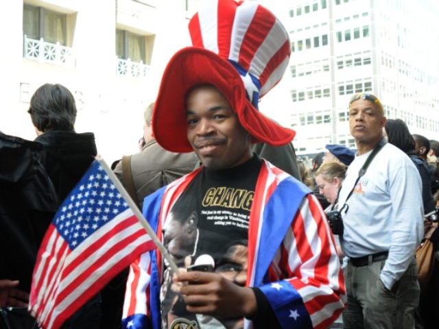 Hollywood Howton, 35, of Jersey City shows his patriotism near Ground Zero for President Obama's visit Thursday.