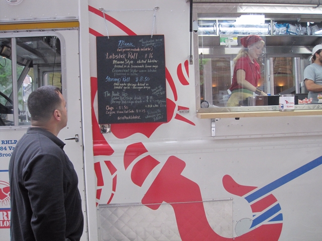 A customer checked out the menu Monday.