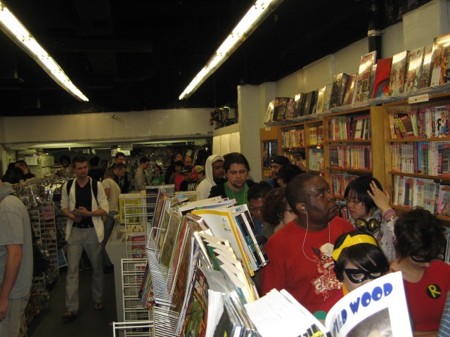 The fans bide their time patiently Saturday for free comics at Jim Hanley's Universe on Free Comic Book Day.