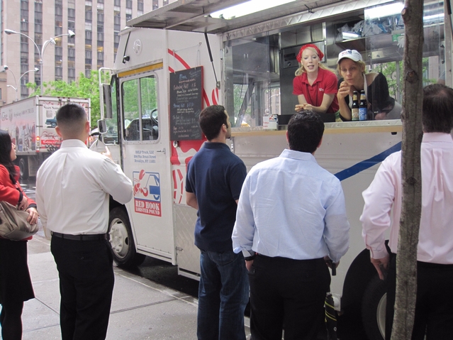 Staff take orders from the hungry lunch crowd.