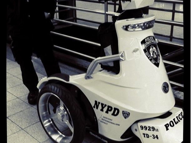 A three-wheeled NYPD Segway scooter.