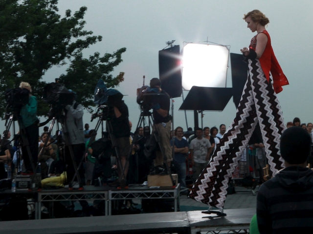 The models walk on stilt for the first episode of the 9th season