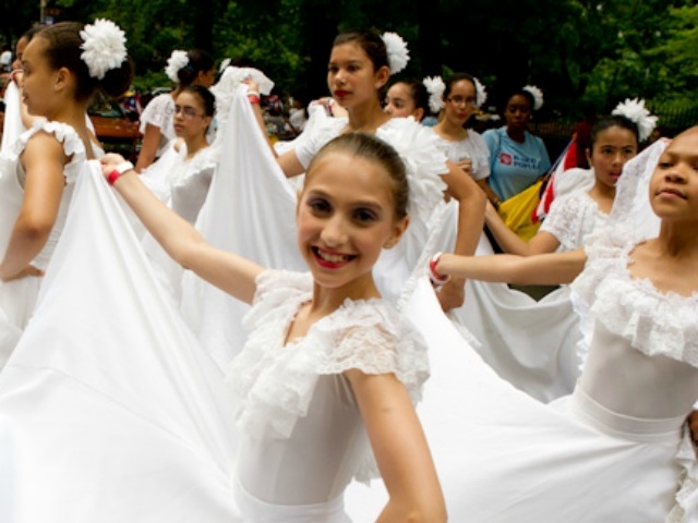 A girl dances in the Puerto Rican Day parade.