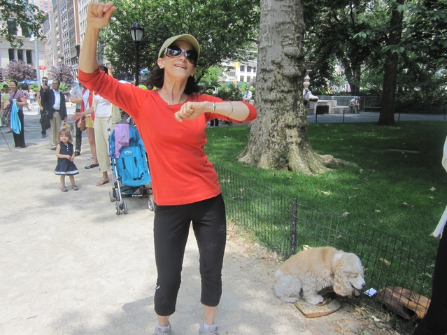 Michele Risa, 60, who runs the Beyond Body Mind Spirit studio participates in Monday's Zumba workout. She would have liked to see some emphasis on food, too, such as encouraging people from switching to white potato french fries to yams.