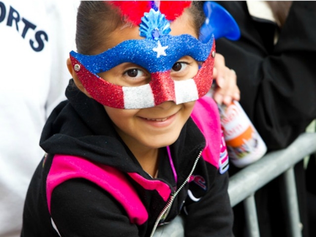 This young paradegoer is in the spirit.