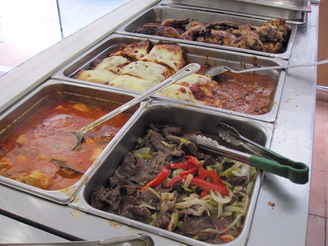 The menu includes Spanish, Pakistani, Indian and American cuisines.