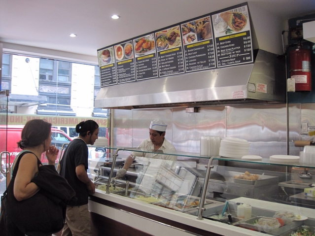 Customers check out the selection at the expanded restaurant.