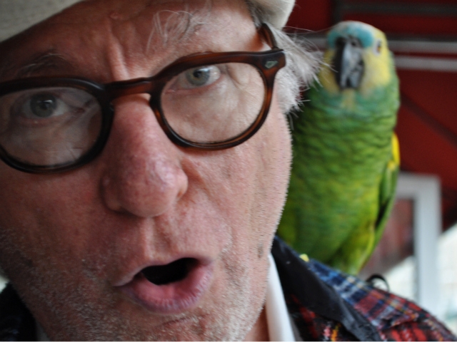Herbert Rauch and his parrot are often seen walking in the neighborhood.