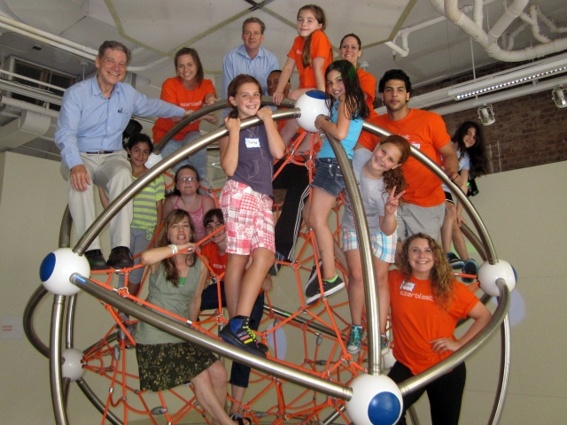 Staff and participants on top of Exerblast's popular Climb-A-Tron.