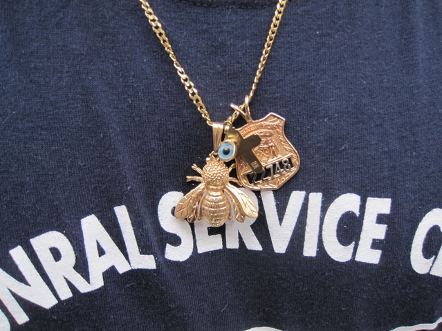 NYPD Beekeeper Tony Planakis showed off his bee necklace.