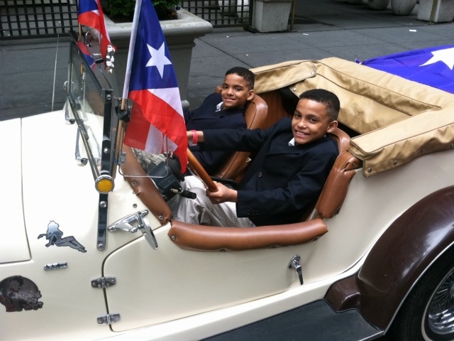 Jeremy Manzanet,10, of The Bronx, (l.) and his twin brother Justin, gear up for their first Puerto Rican Day parade Sunday in a 1929 Mercedes.