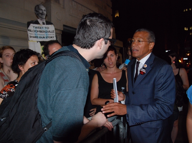 City Councilman Robert Jackson was one of the few members who stopped to speak with the dozens who protested outside.
