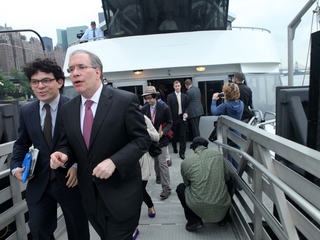 Manhattan Borough President Scott Stringer (second from left) disembarks at the East 34th Street landing after the new service's maiden voyage.