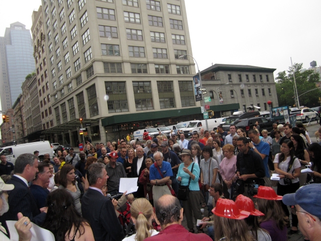 More than 100 people came out Friday morning to rally against fire company cuts.