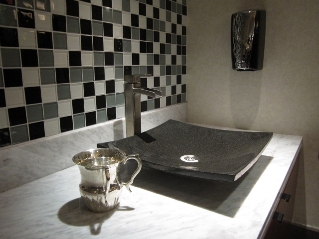 A handwashing station for observant Jews is one of the few indications that the restaurant is kosher.