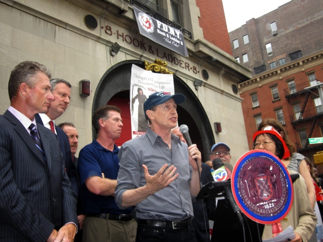 Actor Steve Buscemi, who previously worked as a firefighter, urged the crowd to take action immediately.