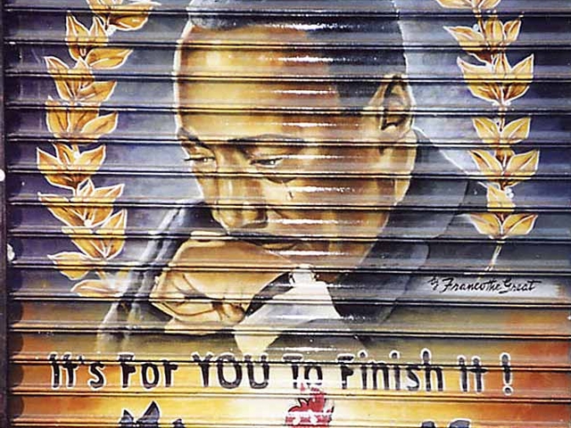 Gaskin says this mural of Martin Luther King Jr. was lost when the security gates of the store it was painted on underwent construction.