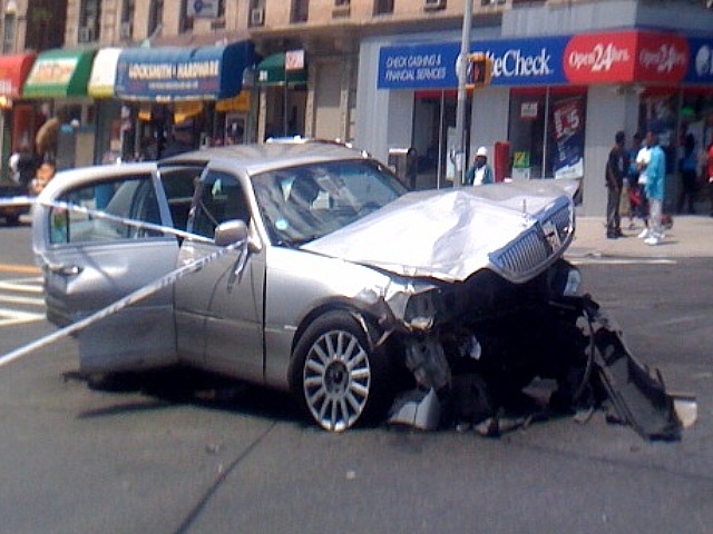 Wreckage of one car involved in crash that killed an elderly woman at W. 145th Street and Seventh Avenue in Harlem.