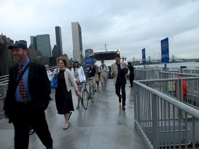 Ferry riders disembark at East 34th Street at Monday's maiden voyage.