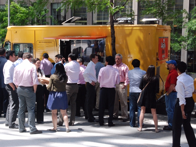 The food trucks have attracted crowds of hungry office workers.