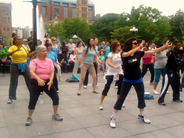 New Yorkers dance the pounds away with a Zumba class in Washington Square Park as part of the BeFitNYC Festival Sunday.