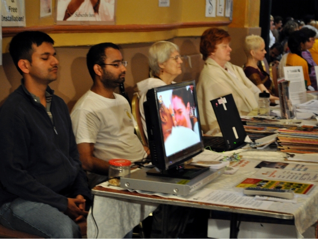 Volunteers for Amma took a break and meditated in the morning session.