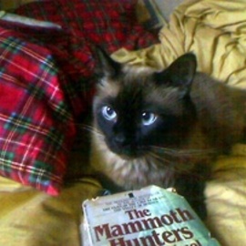 Ari-with-book_medium