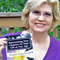 Nadia_giordana_with_book_-_less_red_thumb