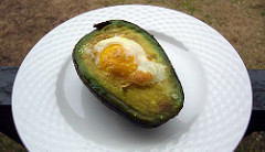 Egg yolk in avocado by Kent Wang egg in avocado photo