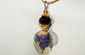 The Edge of Forever: Lampwork beaded Necklace Swirls of Purple and Blue with Gold Filled Wire