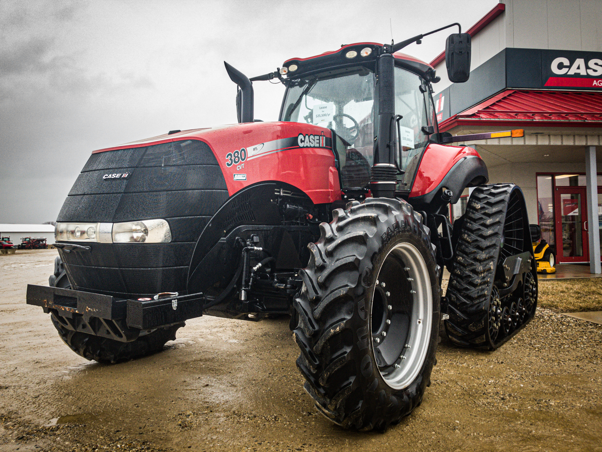 Even with a little rain, the red paint of a Case IH tractor stands out