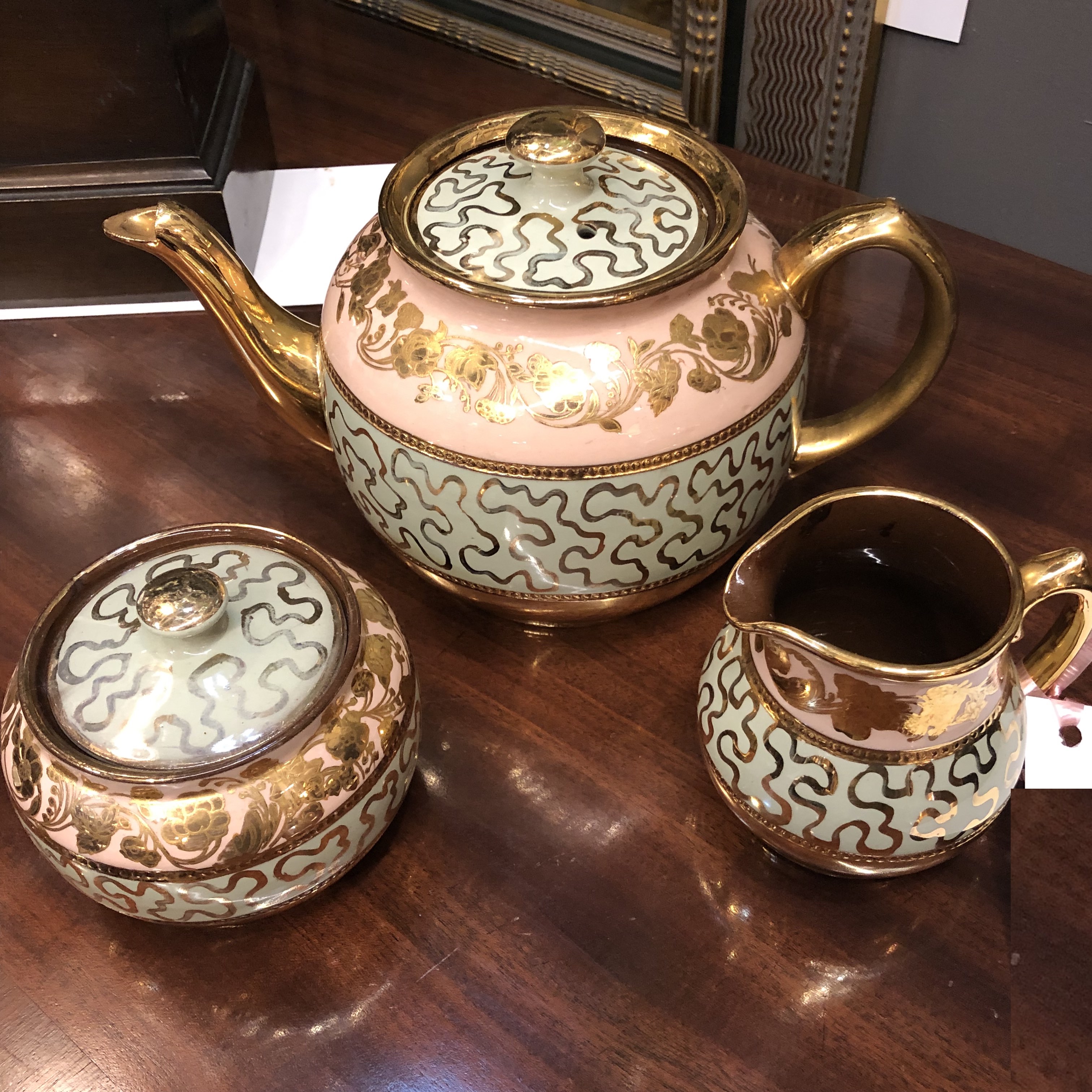 antique tea set with distinctive coloration and design from