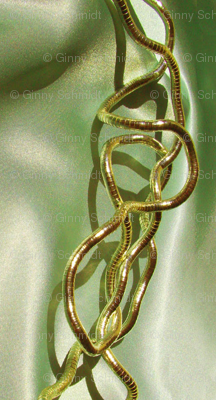 Gold Filigree Links on Spring Green Satiny Background