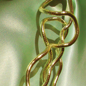 Gold Filigree Links on Spring Green Satiny Background