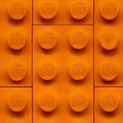 large 'love' bricks in orange