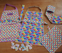 Play kitchen accessories and aprons