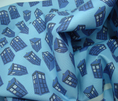 Doctor Who - spinning tardis on light blue